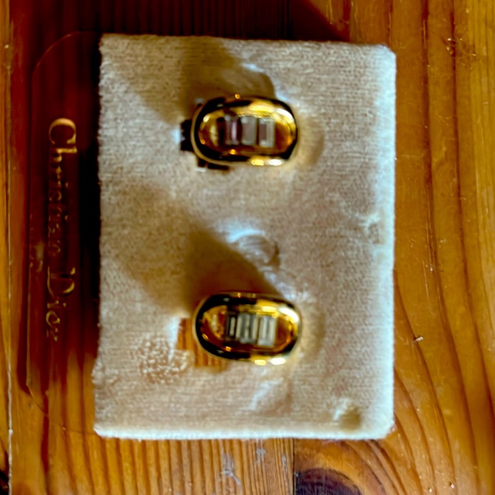 Christian Dior signed gold plated clip on earrings with clear crystals
